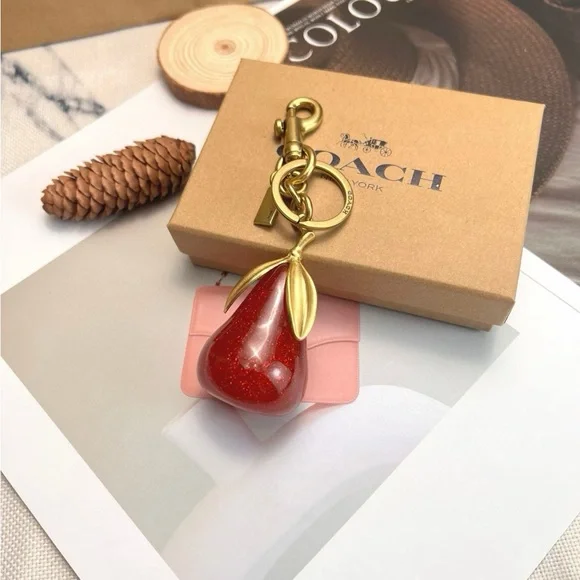Coach Sparkling Red and Gold Pear Key Holder - Picture 4 of 6